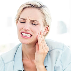 manage pain after wisdom tooth extraction